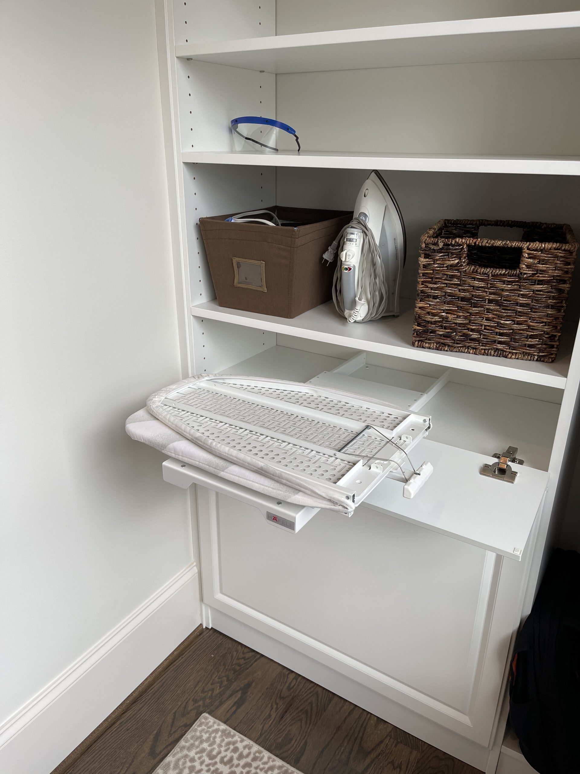 Organized laundry room by The Closet Rehab